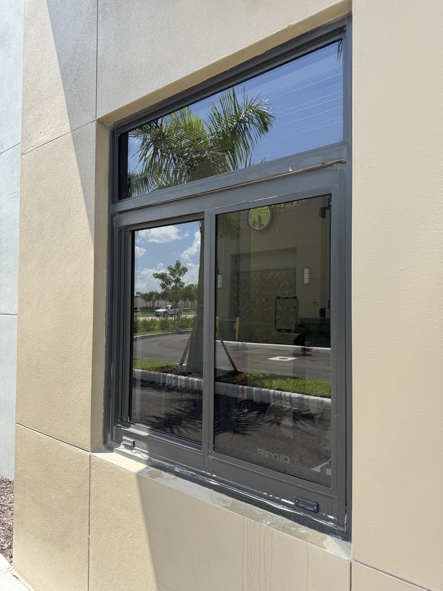 Streak-free commercial glass door and window cleaning at a Cape Coral plaza